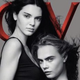 Illustration for article titled Cara Delevingne Holds Kendall Jenner Like a Baby, Nuzzles Her Boob
